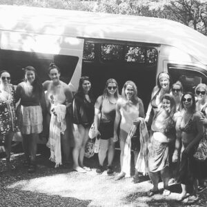 Large group using Nosara group transportation with Gypsy Cab Nosara in front of a van